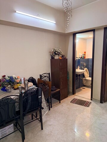 Living Room in 1 BHK Apartment at Lodha Amara, Kolshet Road – for Sale