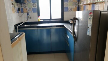 Kitchen in 1 BHK Apartment at Raunak Delight, Owale – for Rent