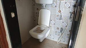 Bathroom in 1 BHK Apartment at Raunak Delight, Owale – for Rent