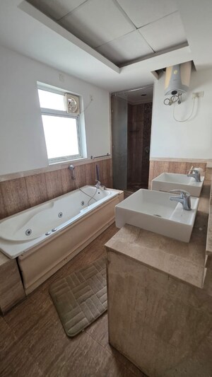 Bathroom in 4 BHK Apartment at Unitech Heritage City, Sector 25 – for Sale