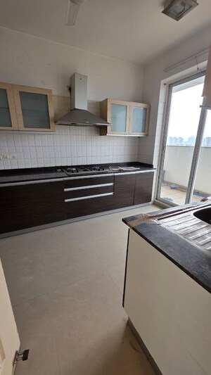 Kitchen in 4 BHK Apartment at Unitech Heritage City, Sector 25 – for Sale