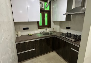 Kitchen in 3 BHK Builder Floor at South Extension I – for Sale