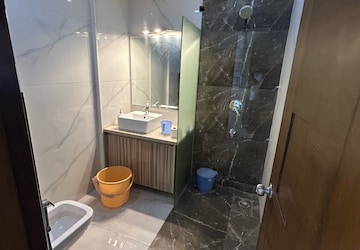 Bathroom in 3 BHK Builder Floor at South Extension I – for Sale