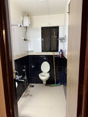 Bathroom in 2 BHK Apartment at Manavsthal Heights, Andheri East – for Rent