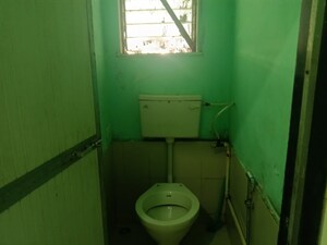 Bathroom in 1 BHK Apartment at Saroj CHS, Chakala – for Rent