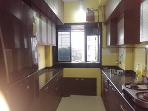Kitchen in 1 BHK Apartment at Comet Apartment, Bhakti Park – for Sale