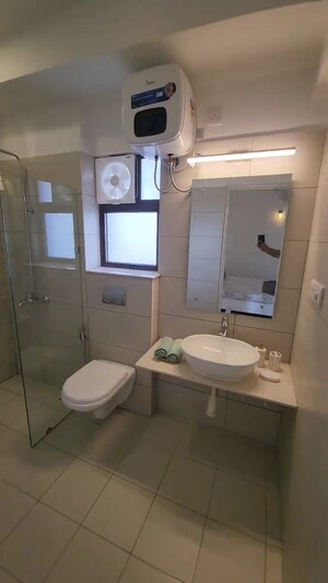 Bathroom in 2 BHK Apartment at Ashiana Town, Sector 39 – for Sale