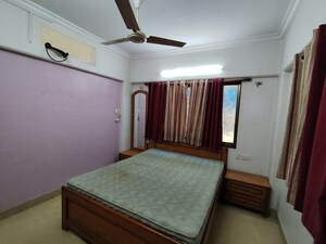 Bedroom in 1 RK Apartment at Parmar CHS, Vile Parle East – for Rent