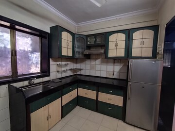 Kitchen in 1 RK Apartment at Parmar CHS, Vile Parle East – for Rent