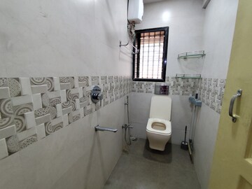 Bathroom in 1 RK Apartment at Parmar CHS, Vile Parle East – for Rent