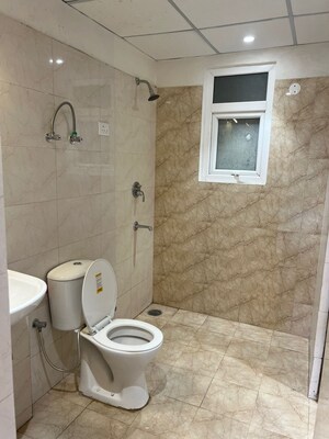 Bathroom in 3 BHK Apartment at NK Sharma Savitry Greens 2, Ghazipur – for Sale