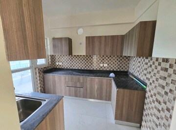 Kitchen in 3 BHK Apartment at Adani M2K Oyster Grande, Sector 102 – for Sale