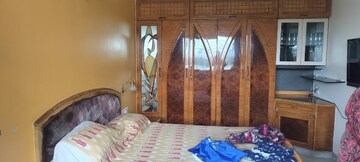 Bedroom in 2 BHK Apartment at Powai Cosmopolitan CHS, Powai – for Rent