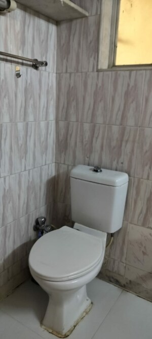 Bathroom in 2 BHK Apartment at Powai Cosmopolitan CHS, Powai – for Rent