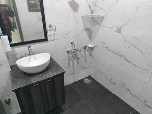 Bathroom in 4 BHK Apartment at Sector 33a Noida – for Rent