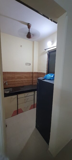 Kitchen in 1 RK Apartment at Om Fiona Apartment, Kopar Khairane – for Sale