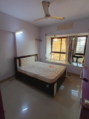 Bedroom in 2 BHK Apartment at Lokhandwala Whispering Palms, Kandivali East – for Rent