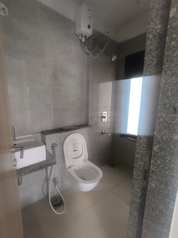 Bathroom, godrej-nirvaan 2 Bedroom 667 Sq.Ft. Apartment In Themghar Thane 9327683
