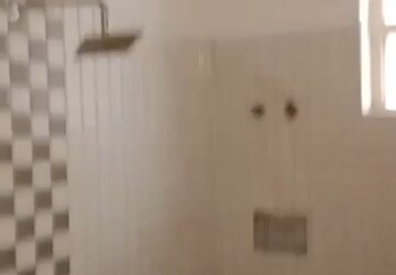 Bathroom in 2 BHK Apartment at Krish Aura, Alwar Bypass Road – for Sale