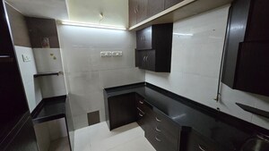 Kitchen in 1 BHK Apartment at Borbhat SRA Society, Borivali West – for Rent