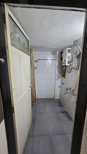 Bathroom in 1 BHK Apartment at Borbhat SRA Society, Borivali West – for Rent