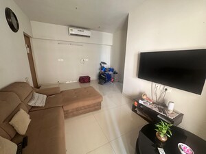 Living Room in 2 BHK Apartment at Rustomjee Azziano Wing E, Thane West – for Rent