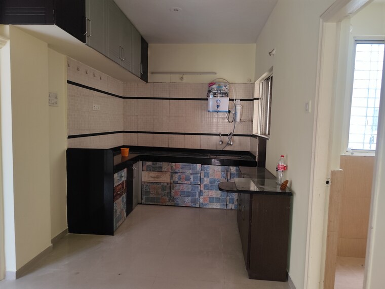 Kitchen, paranjape-richmond-park 2 Bedroom 1050 Sq.Ft. Apartment In Rahatani Pune 9328493