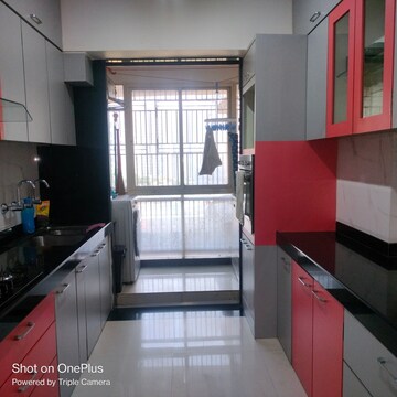 Kitchen in 3 BHK Apartment at Rustomjee OZone, Goregaon West – for Rent