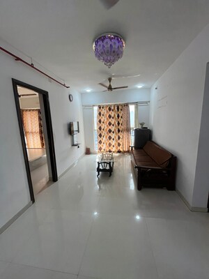 Living Room in 2 BHK Apartment at Marathon Eminence, Mulund West – for Rent