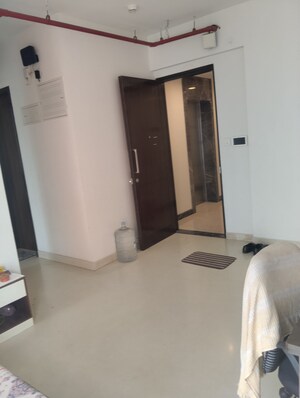 Building Lobby in 1 BHK Apartment at Piramal Revanta Ravin, Mulund West – for Rent