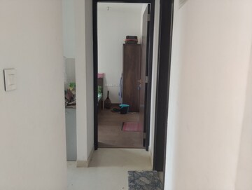 Building Lobby in 1 BHK Apartment at Piramal Revanta Ravin, Mulund West – for Rent