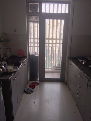 Kitchen in 1 BHK Apartment at Piramal Revanta Ravin, Mulund West – for Rent