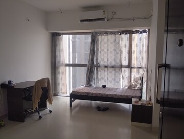Living Room in 1 BHK Apartment at Piramal Revanta Ravin, Mulund West – for Rent