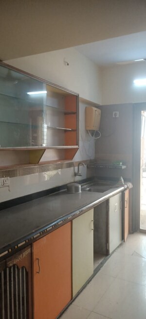 Kitchen in 2 BHK Apartment at Regency Estate, Dombivli East – for Rent