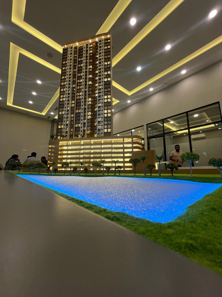 Swimming Pool, ellora-rainbow-life 2 Bedroom 663 Sq.Ft. Apartment In Rohinjan Navi Mumbai 9329000