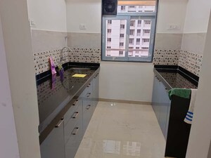 Kitchen in 2 BHK Apartment at Coral Heights, Kavesar – for Rent