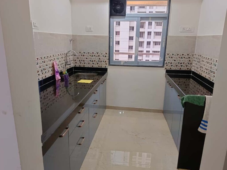 Kitchen, coral-heights 2 Bedroom 600 Sq.Ft. Apartment In Kavesar Thane 9329135