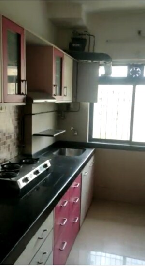 Kitchen in 3 BHK Apartment at Green Acres Apartment, Waghbil – for Rent