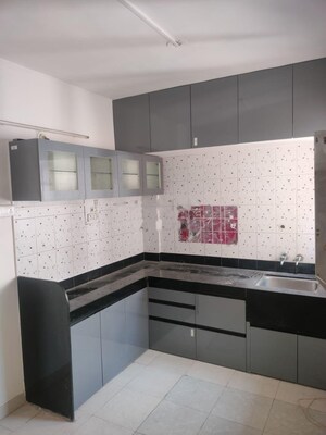 Kitchen in 2 BHK Apartment at Spring Glory Co-Operative Society, Kharadi – for Rent