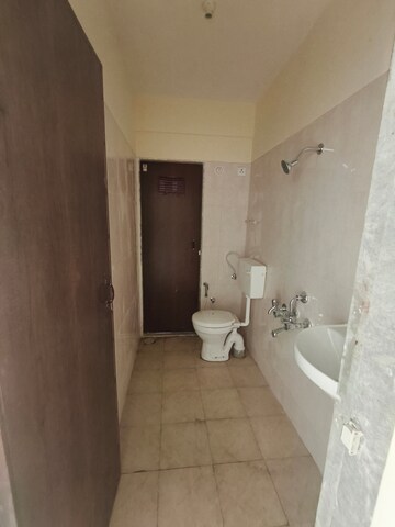 Bathroom in 1 BHK Apartment at Ram Pushpanjali Residency, Owale – for Rent