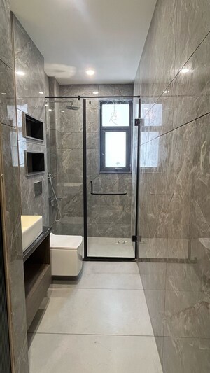 Bathroom in 4 BHK Builder Floor at Ansal API Esencia, Sector 67 – for Sale