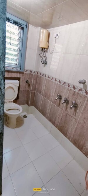 Bathroom in 1 BHK Apartment at Lokhandwala Complex – for Rent