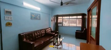 Living Room in 1 BHK Apartment at Lokhandwala Complex – for Rent