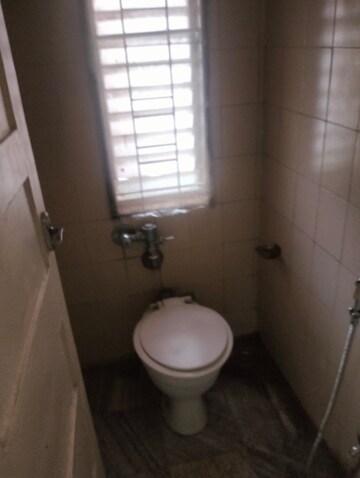 Bathroom in 1 BHK Apartment at Dorabjee Elegance, Nibm – for Rent