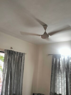 Bedroom in 1 BHK Apartment at Dorabjee Elegance, Nibm – for Rent