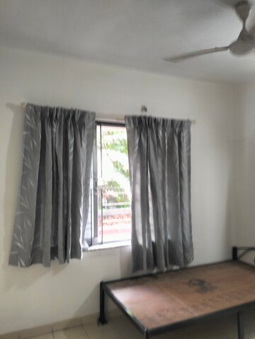 Bedroom in 1 BHK Apartment at Dorabjee Elegance, Nibm – for Rent