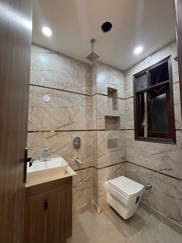 Bathroom in 3 BHK Builder Floor at Dwarka Mor – for Rent