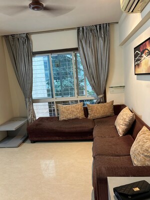 Living Room in 1 BHK Apartment at Manju Mahal Apartment, Pali Hill – for Sale