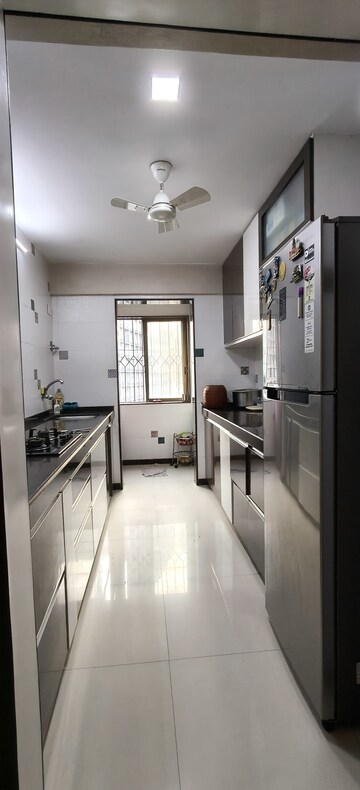 Kitchen in 2 BHK Apartment at Palash Towers, Andheri West – for Sale