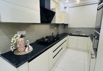 Kitchen in 3 BHK Apartment at The Suman Marvelous, Vip Road – for Sale